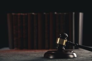 law concept open law book with wooden judges gavel table courtroom law enforcement office black background 253401 5712